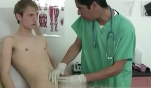Young gay man getting physical exam His stomach muscles were