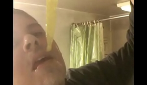 Faggot eats cum filled condom