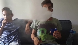 Italian guy drinks cold water after a mint juice vape